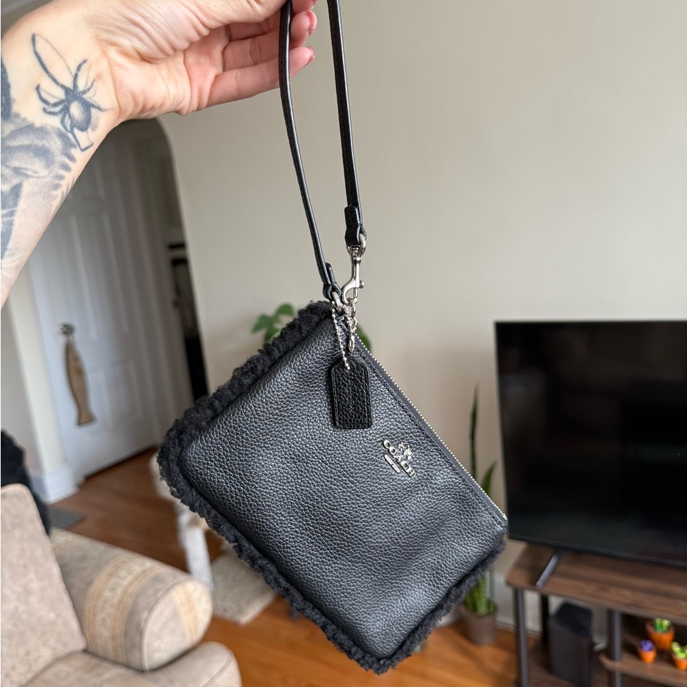 Coach Black Clutch with Fur Edge Detail